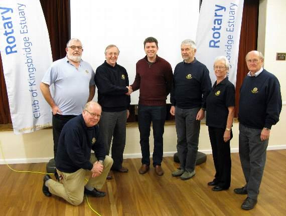 Heartstart instructors from Kingsbridge Estuary Rotary Club congratulate their 1,000th trainee: L-R: Steve Mullen, Tony Corr - kneeling, Steve Kerr, Ben Rogers - trainee, Richard Cropper, Elizabeth Bewley Jones and David Graham