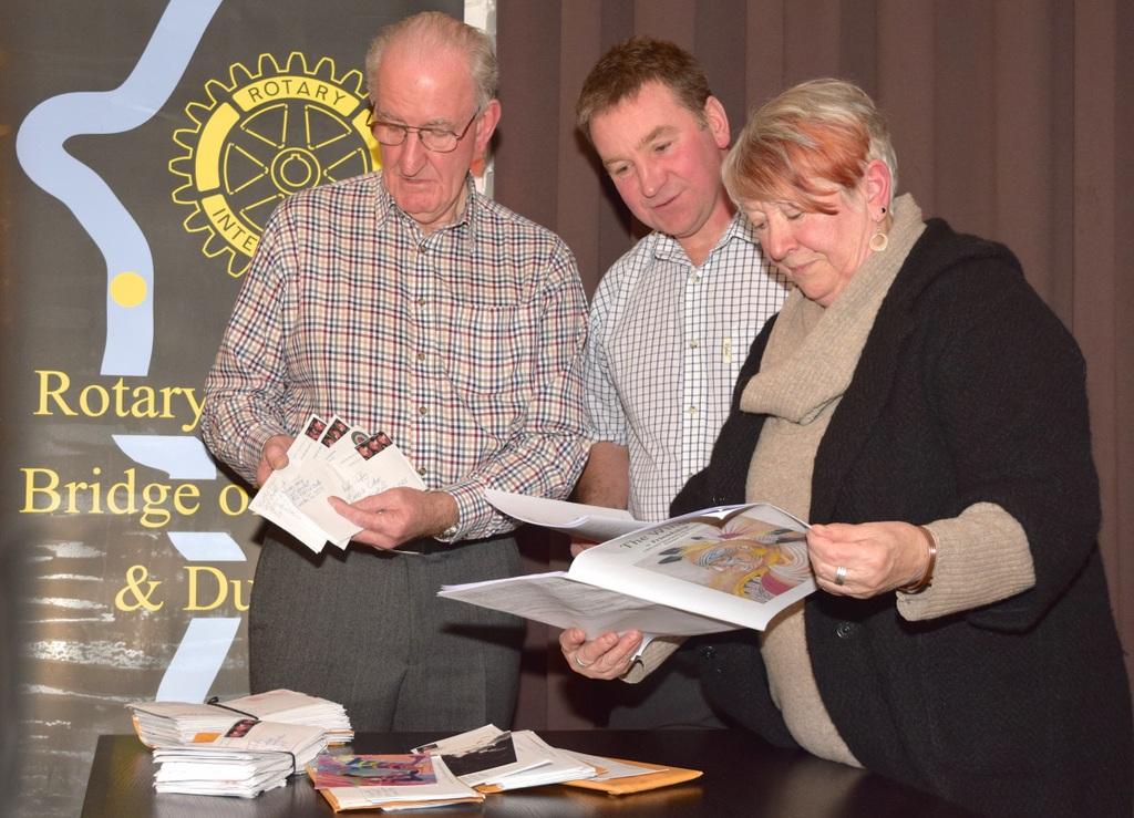 Angela Jeffs (right) shows correspondence with prisoners on Death Row, America, to John Kilby, Speaker