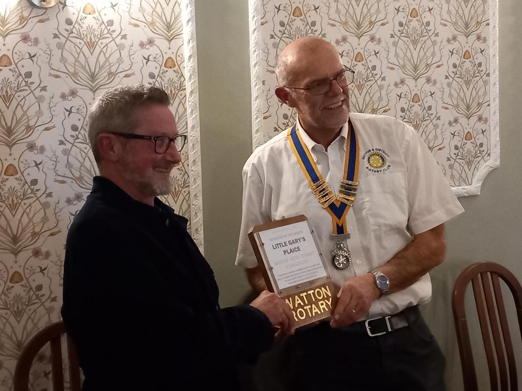 Gary Wright receives award from Rotary President Mike Gicquel