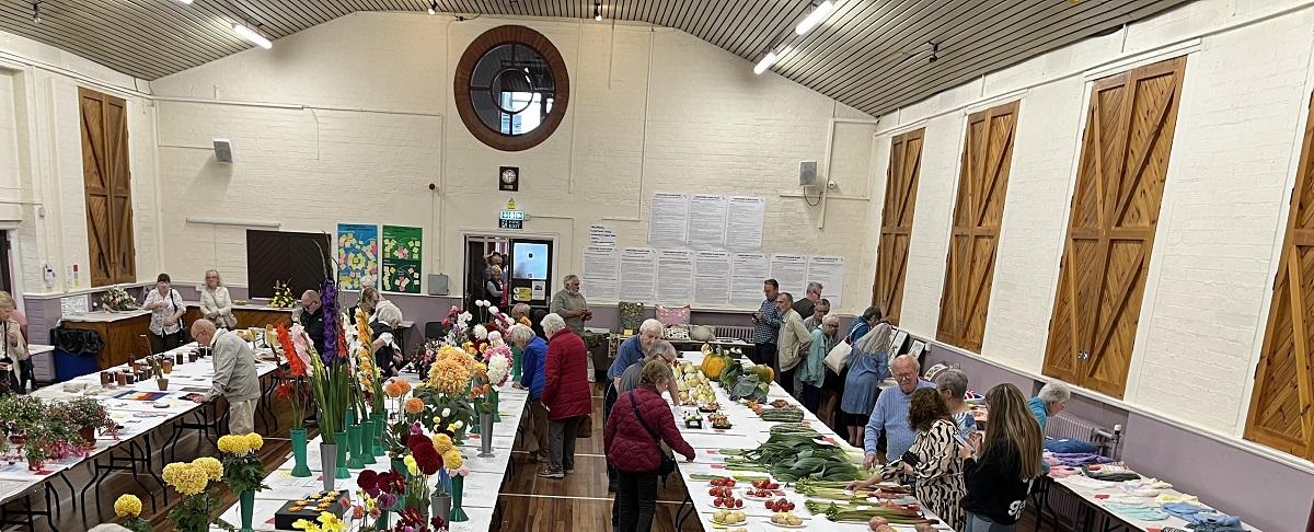 Longtown Flower Show 2022 - Looking at the exhibits following the judging at Longtown Flower Show