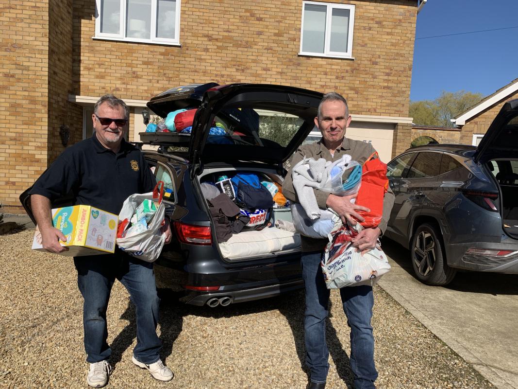 Andy Kerr and Malcolm Catlin preparing to leave for the Ukraine border with a car full of necessary items.