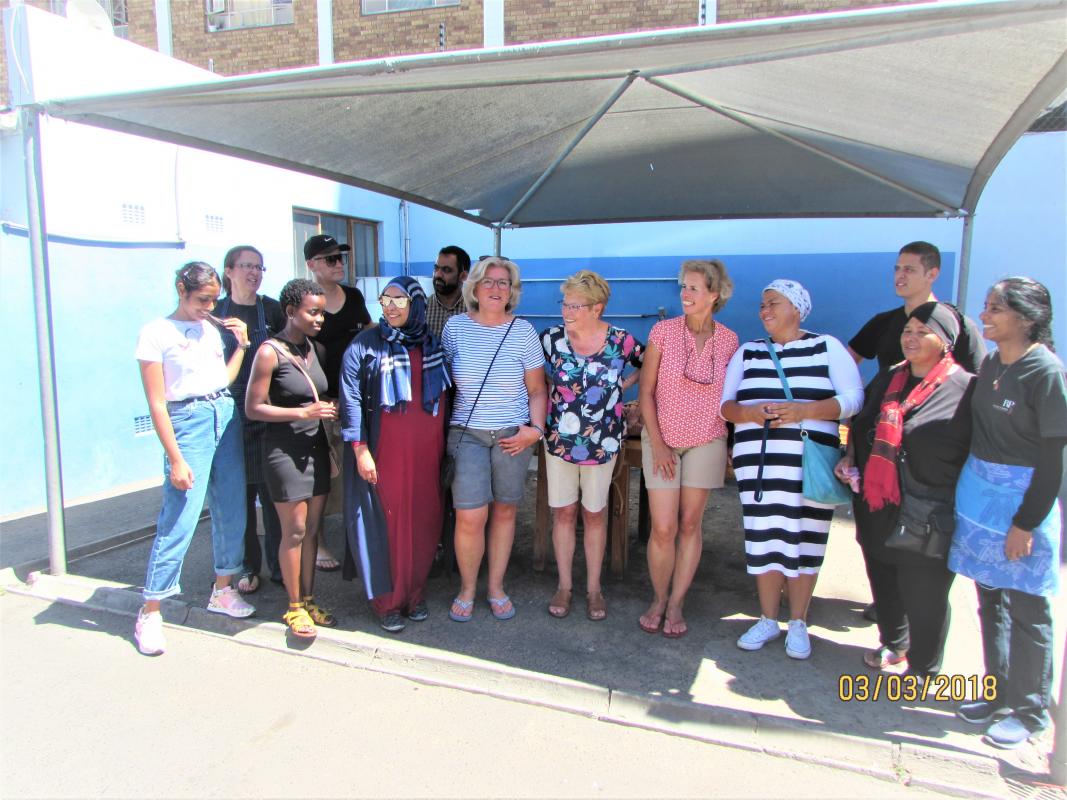 Rotarian Margaret Trevette (centre) with the volunteers at RPJ “Helping Hands”, Cape Town