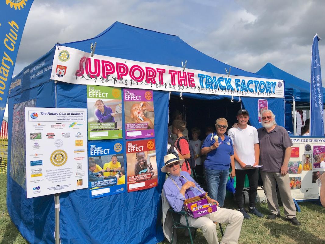 The gazebo at the Melplash Show showing off the new Trick Factory banner. Note all the youngsters inside the gazebo.