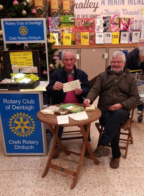 Rotarians David and Robin selling the raffle tickets at Morrisons, Denbigh