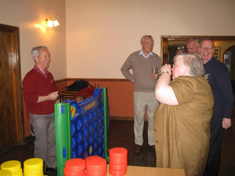 Rtn Hazel Haas from Knaresborough needs a drink before coping with the giant Connect4 game!