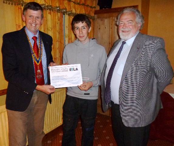 President Elfed presents Joe with the District 1180 RYLA Certificate.  Also in the photograph is New Generations Chair, Alwyn Thomas