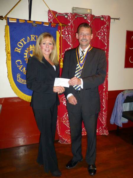 Cambuslang Rotary Club President presents cheque for £1500 to Julie Lennox from Princess Royal Trust Lanarkshire Carers Centre