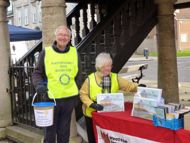 President Marie and ex-Treas Peter Roberts man the Market Stall on 13 November