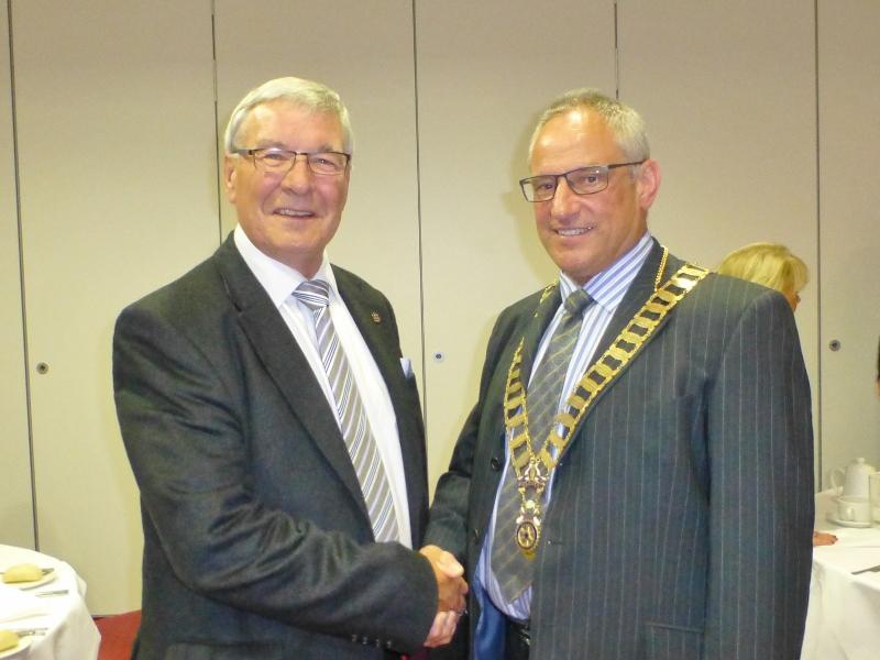 15th June 2016 - Club Handover Dinner - Past President Robert Dickie congratulates President Bill Crombie as he starts his second year.