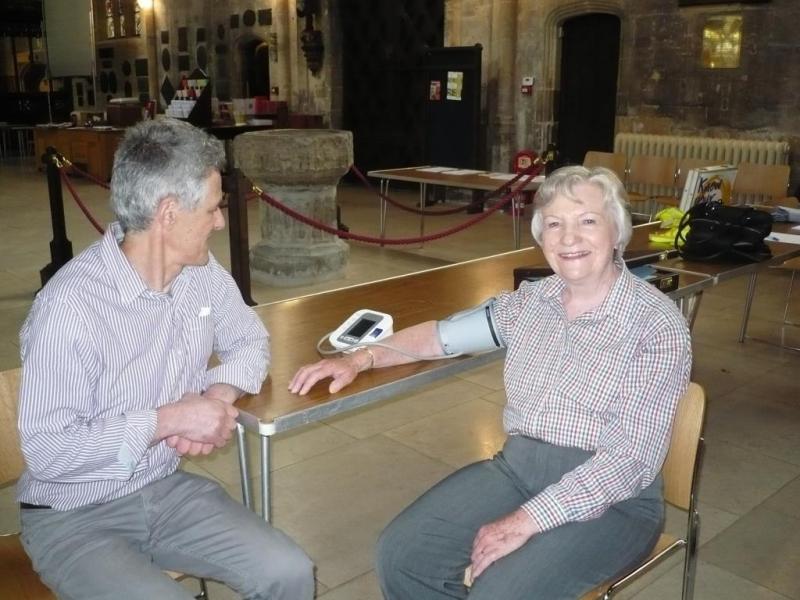 Rotarian Susan Bishop having her Blood Pressure Taken by Jolyon Livingston