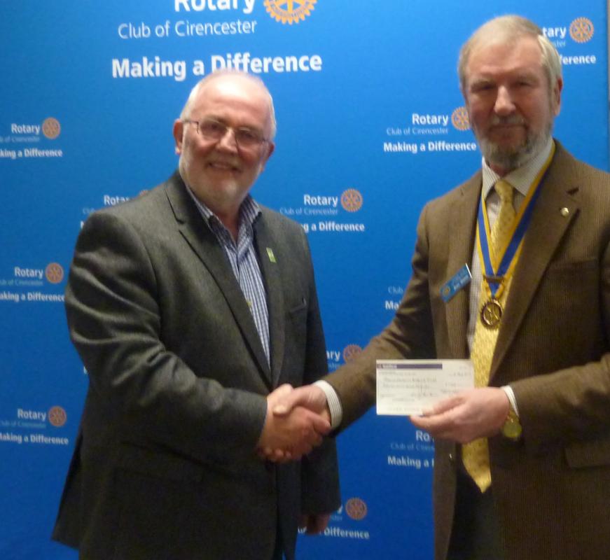 President Brian Skarda presents cheque to the Secretary of GAT, Steve Morton