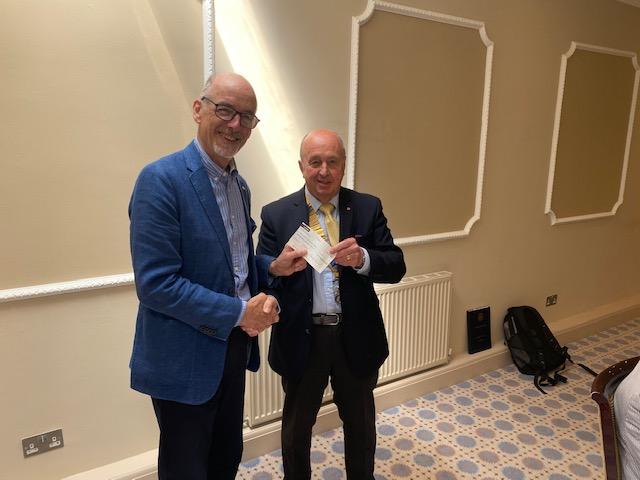 Presentation of cheque by President Mike Gorick to Martin Cowell Chair of Parkinson's UK Oxford Branch 30th May 2022
