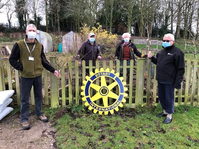 John Gilbody (the school caretaker) David Lilley, Robin Moore and Peter Connor from the Rotary Club of Tarporley