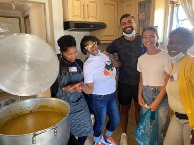 Granddaughter visits Malcom's Soup Kitchen - Kristina and Akeem at Umtha Welanga
