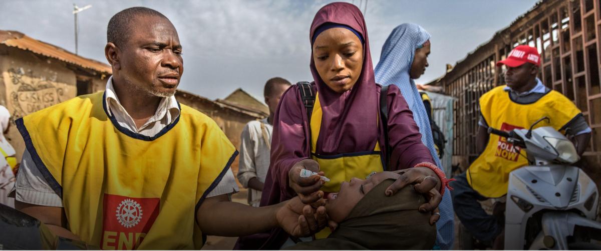 Rotarians at work immunizing children against Polio
