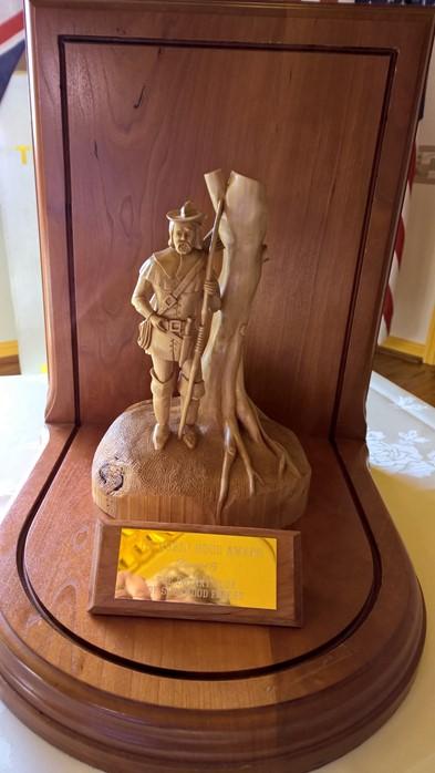 the Robin Hood Award carving