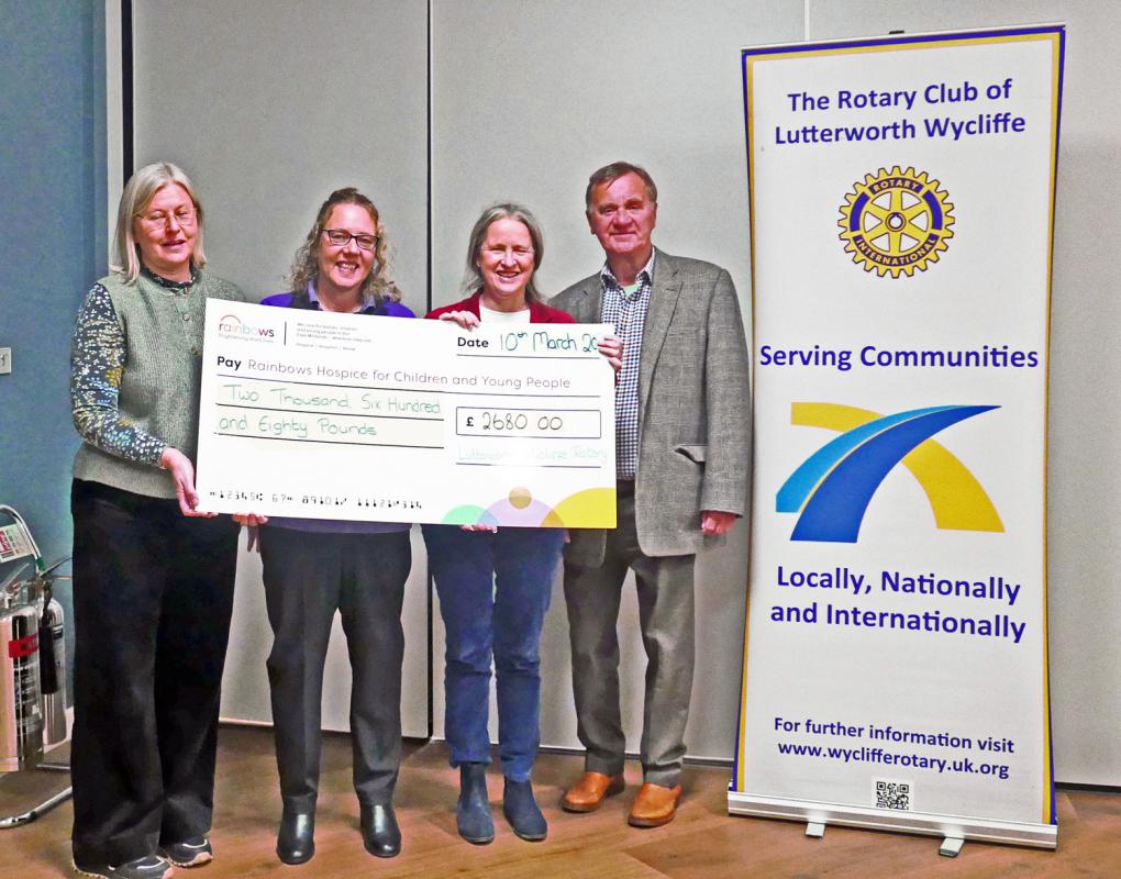 Presentation of the cheque to Kerry Laurie of Rainbows