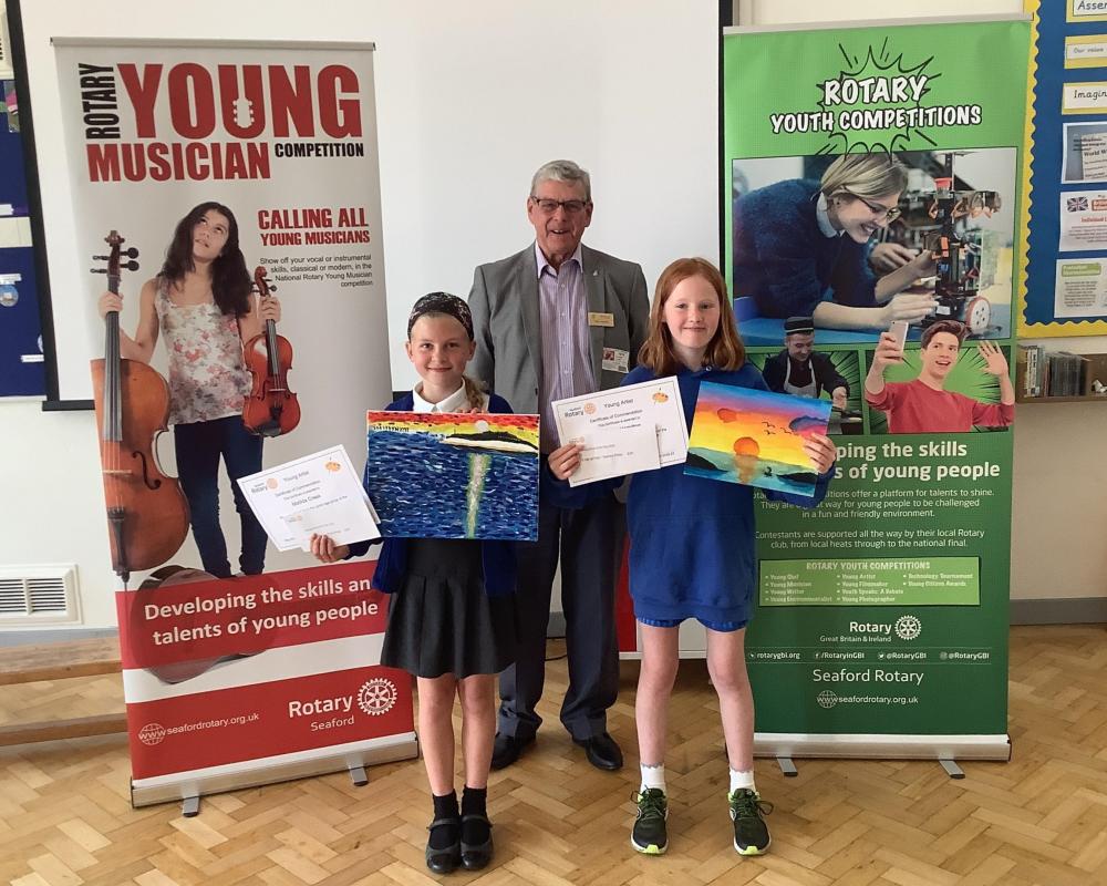 Matilda and Nancy from Cradle Hill winner and runner up of the 7 to 10 age group with ther certificates and prizes presented by Paul Vaesen, Chair Youth Services
