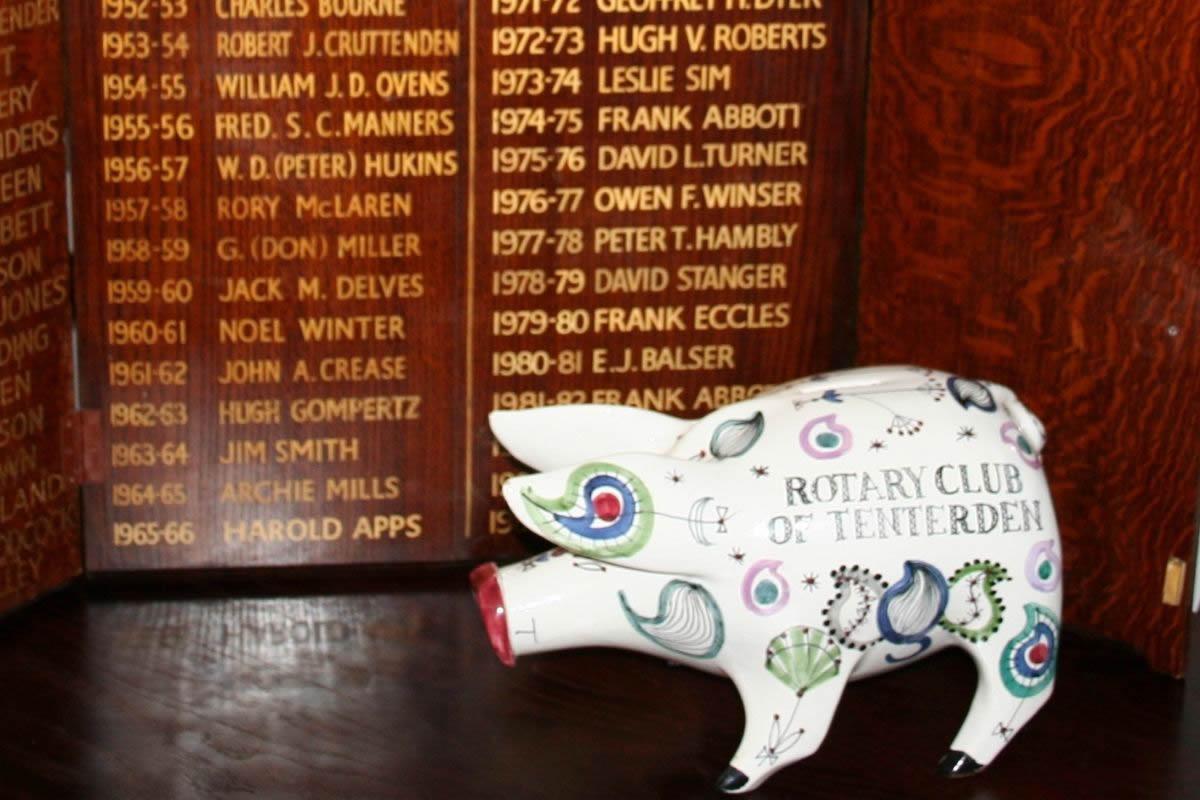 Past Presidents board and fundraising pig