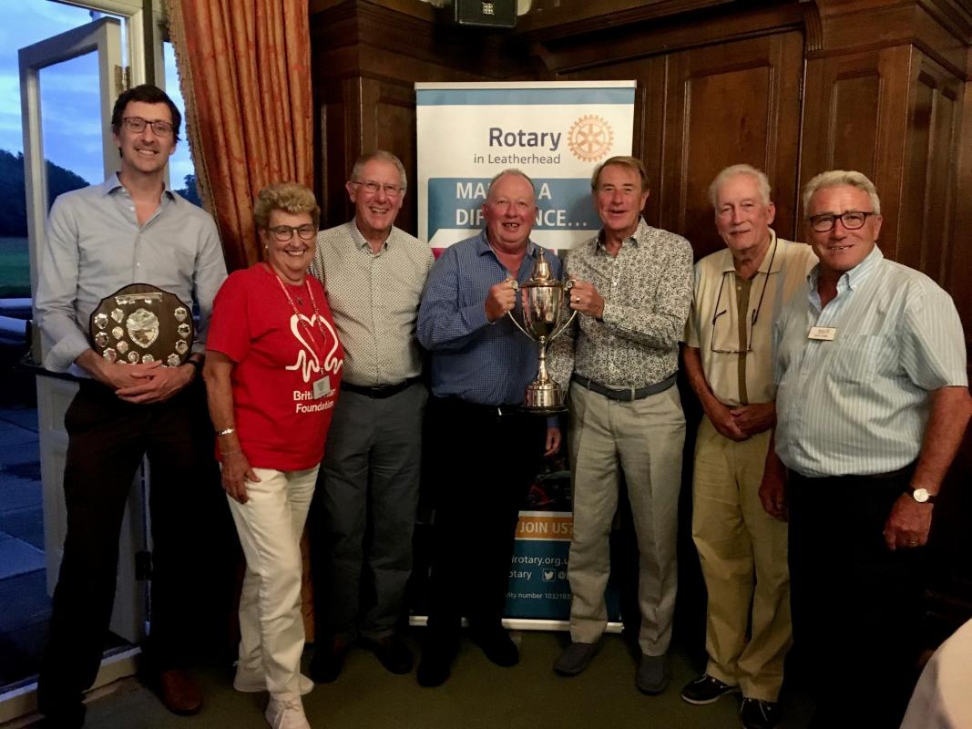 (L to R) Grant Samuel, Shirley West from the British Heart Foundation, The Early Risers, and Gary Zabel, President of Leatherhead Rotary Club and Golf Day organiser.