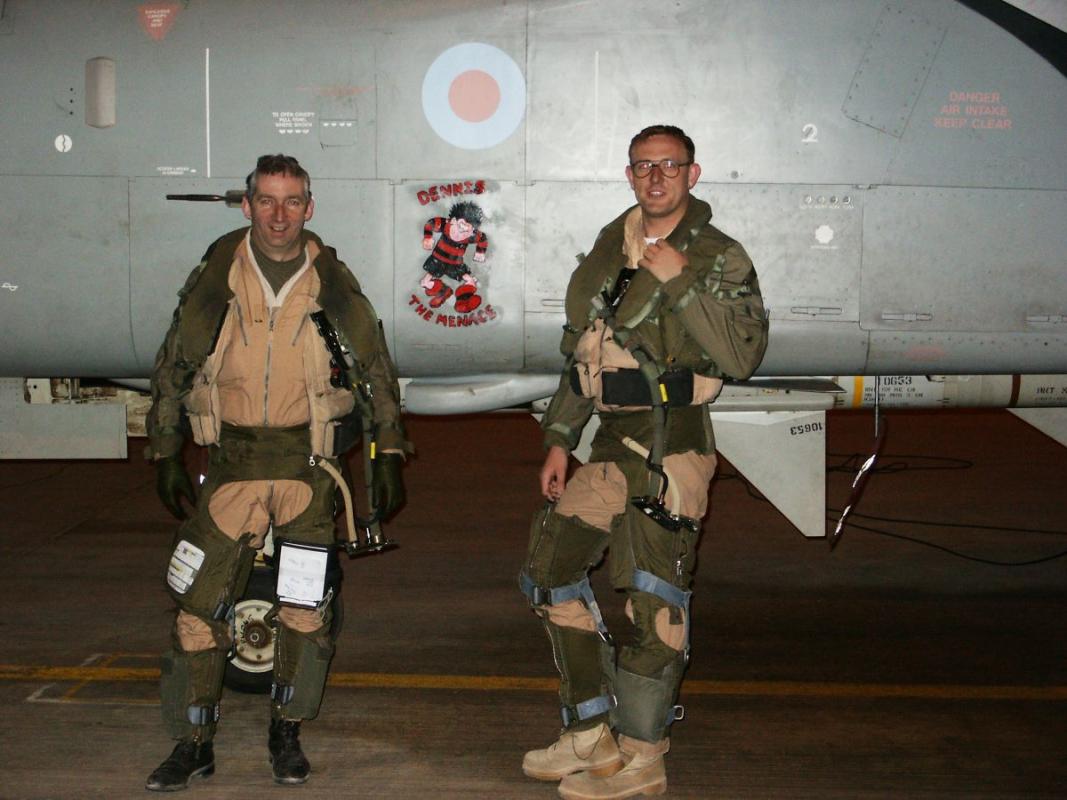 Flight-Lieutenant Roy McIntyre (left) with his navigator, Flight Lieutenant Garry Cooper, in front of their Tornado F3 aircraft, having just completed a six-hour mission during the Gulf War.