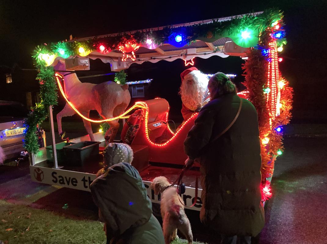 Santa and Rudolph's new trailer on the road
