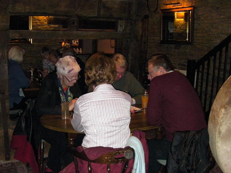 Family Quiz at the Baron from 7pm - The winners with their heads together - Carolyn, Trixie, David and Ian
