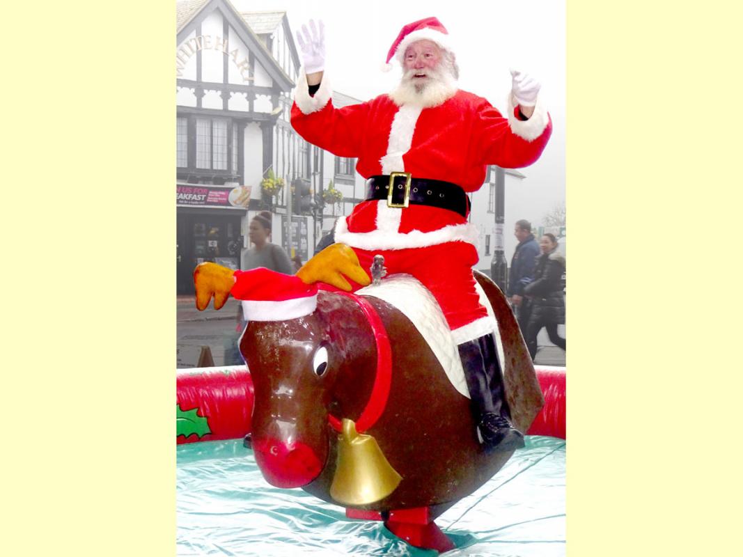 Santa in Witham - Santa rides his bucking reindeer