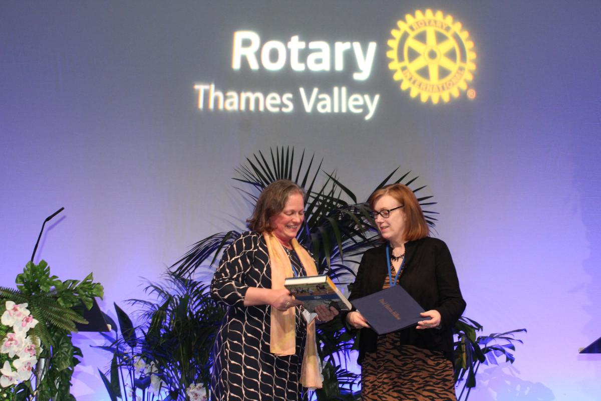 Karen Eveleigh presenting a Paul Harris Fellowship to Professor Dame Sarah Gilbert