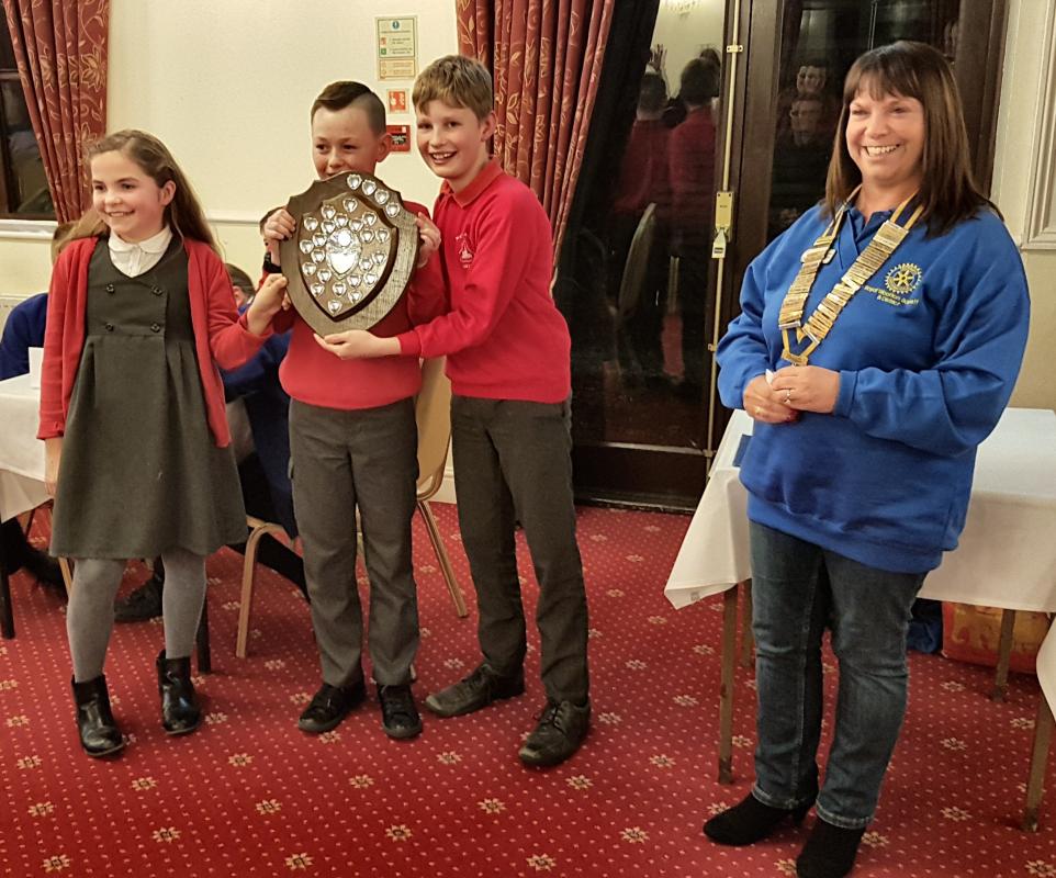 Junior Schools Quiz 2018 - Rotary Club President, Catherine Cadogan, congratulates members of St Mary's team on their win.