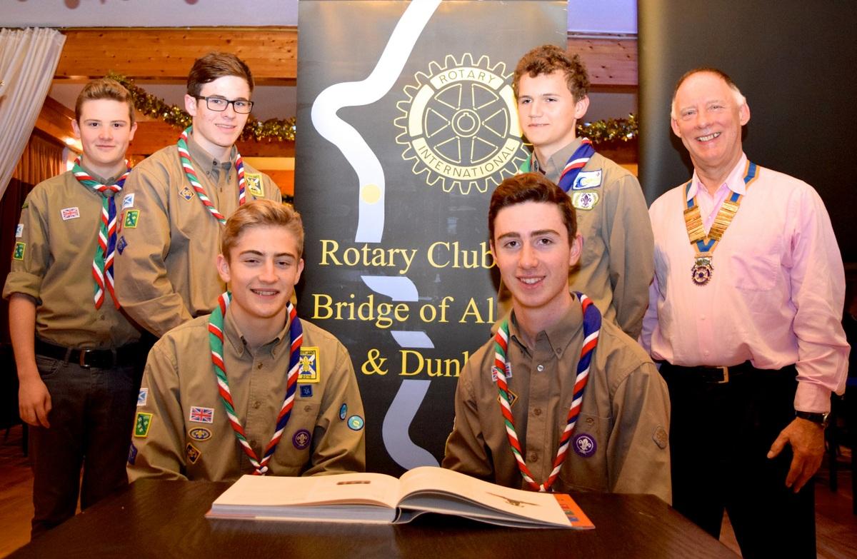 President Nick Rawlings with Scouts from the Forth Valley District. The Bridge of Allan and Dunblane Rotary Club made a contribution of Â£250 towards the Scouts