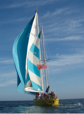 James Cook setting sail - spinnaker and mizzen set.