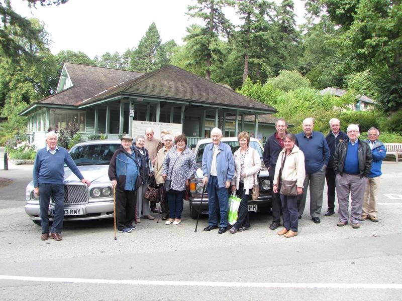 Patient and staff from St. David's Hospice with the Benmtley owners and the Rotarians