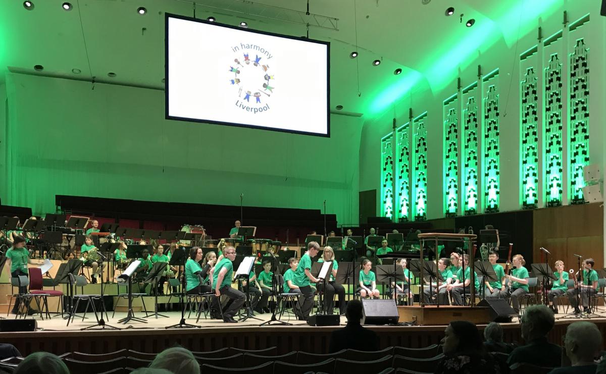 Pupils on stage of Liverpool Philharmonic Hall