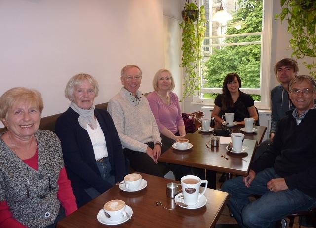 Sue, Molly, Mike, Sia, Ana, Tom, Alan and John relaxing with a drink and a lovely view of Kings Chapel.