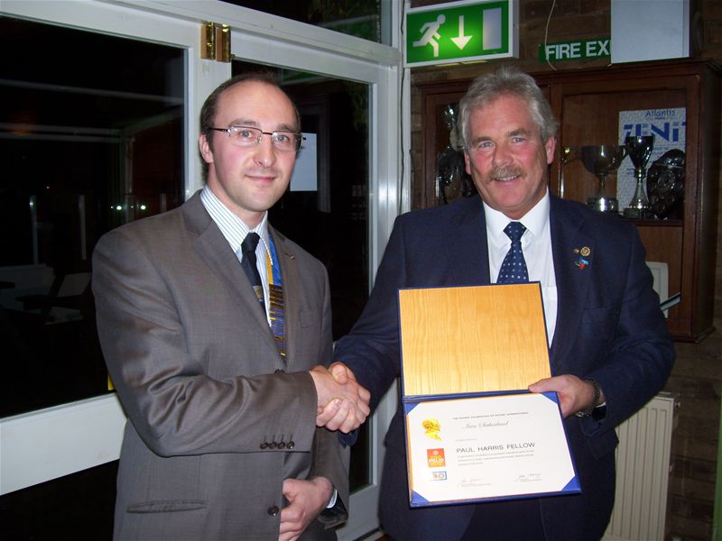 President Peter hands over award