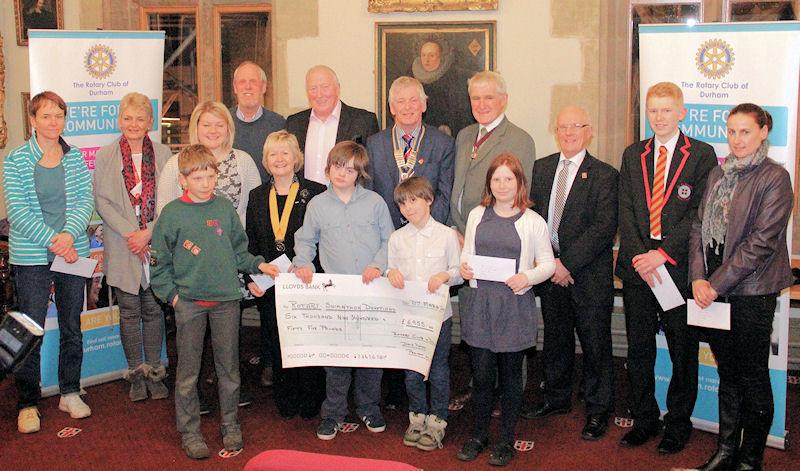 The recipients with President David and the Deputy Mayor