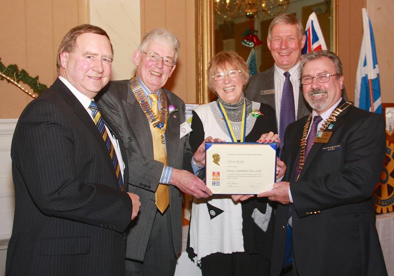 Dec 2012  Rotarian Sylvia Kelly receives an early Xmas present  - 