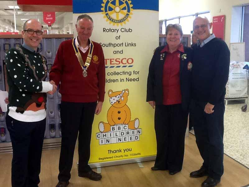 Children in Need Collection - President of Southport Links Geoff Bigg, thanks Lesley Kirkbride of Tesco Kew