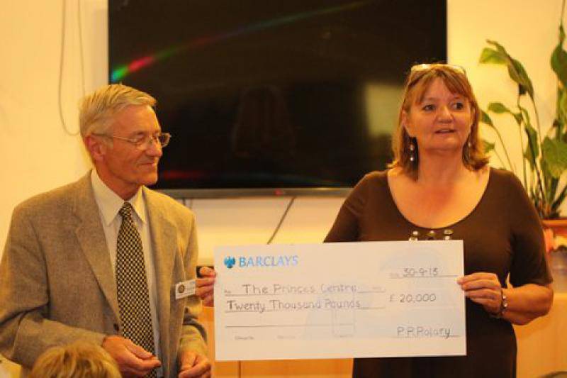 Tom Winkworth presenting a cheque for £20,000 to the Princes Centre on behalf of the Rotary Club of Princes Risborough