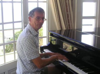 Trevor relaxes from his Presidential duties extemporising at his piano