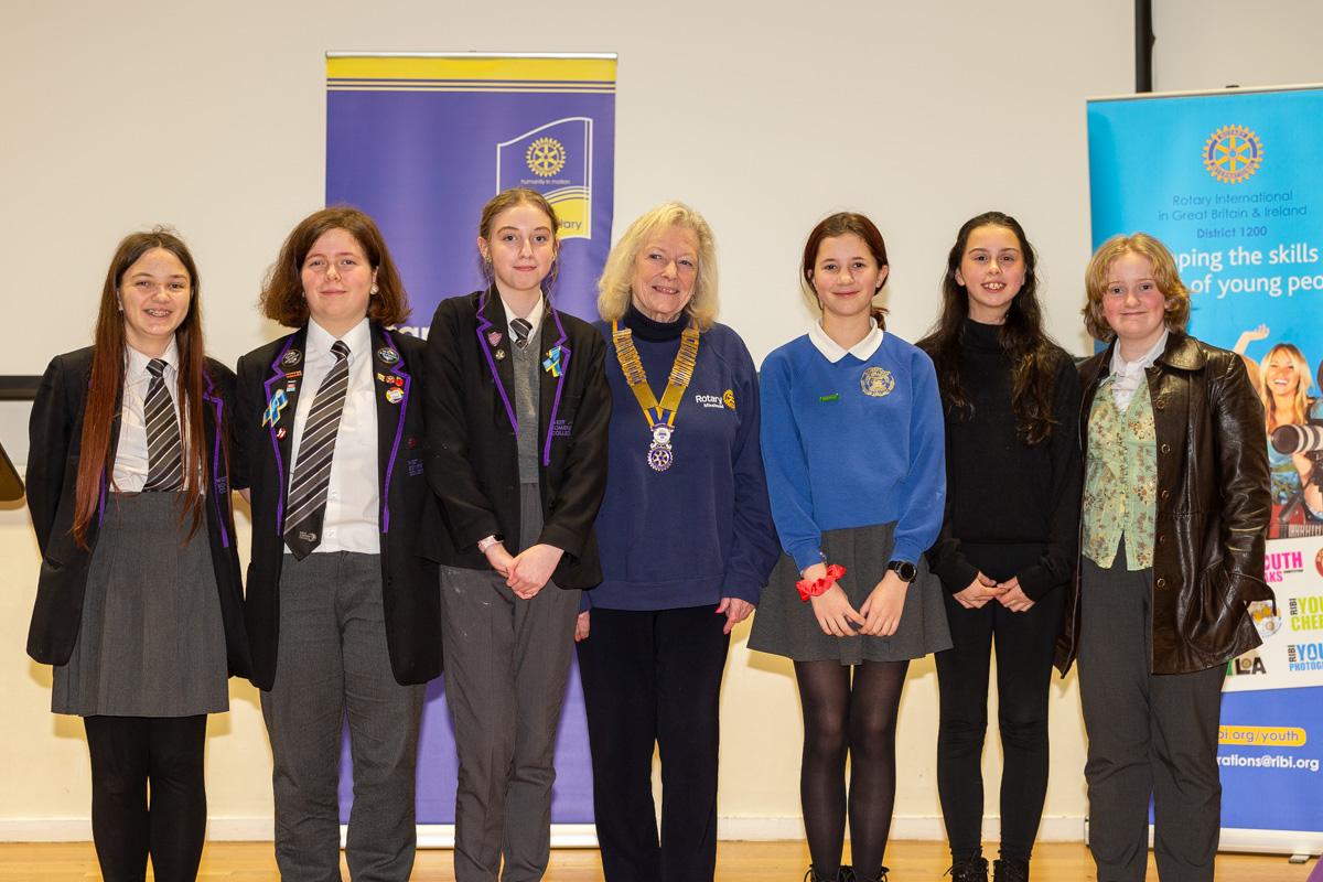 Rotary Youth Speaks a Debate - The Two Winning Teams with Club President Angela