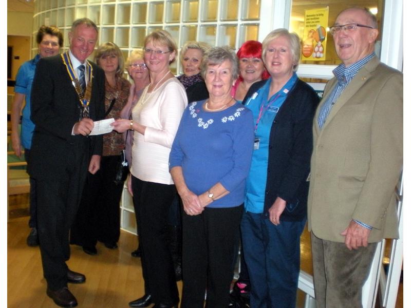 President Geoff Bigg and John Heddon at the cheque handover