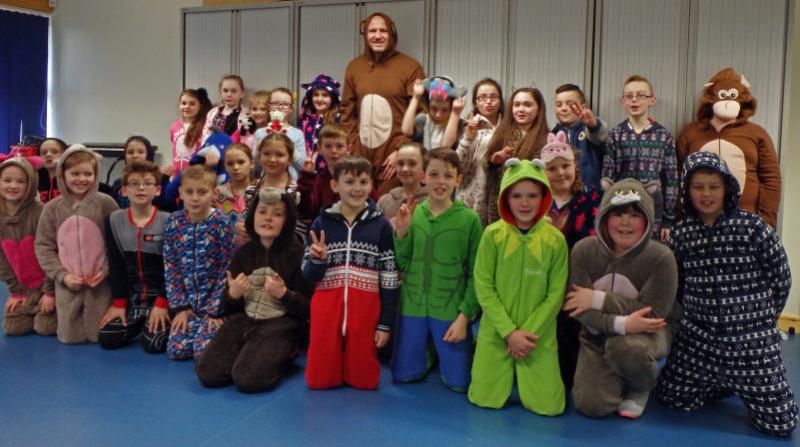 Rotakids at Upperby School raise £295 for Guide Dogs for the Blind.