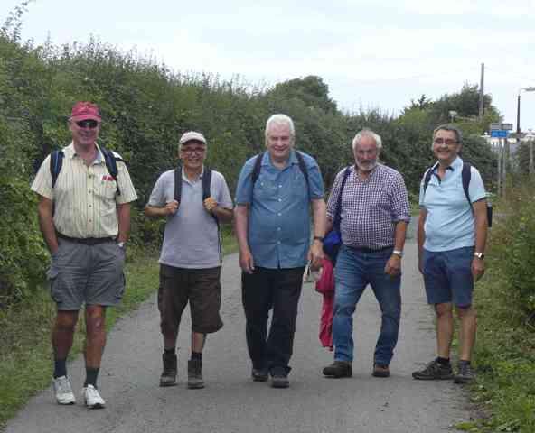 The team of six (counting the photographer Ifor John)