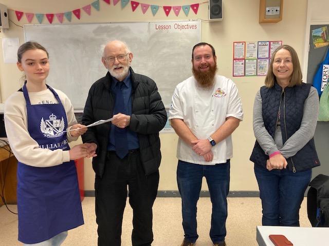 Young Chef Competition - Presentation of £25 voucher Sophie Vickers by Philip Dearden Lindum Lincoln Rotary Club