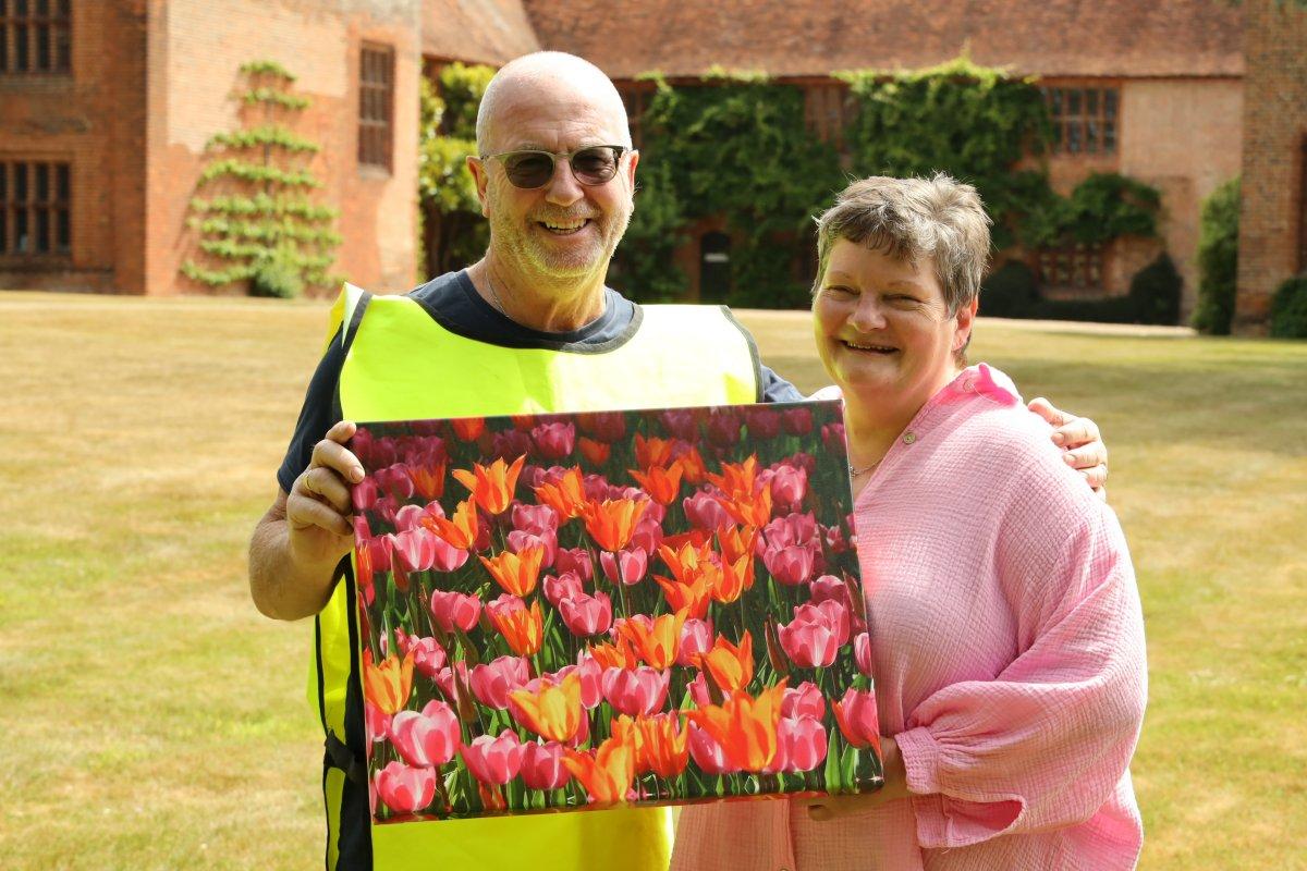 Winners - Rotary Photo Competition 2022 - Winner Moira Hook receives her prize - a Canvas of her image donated by Judge John James (pictured)