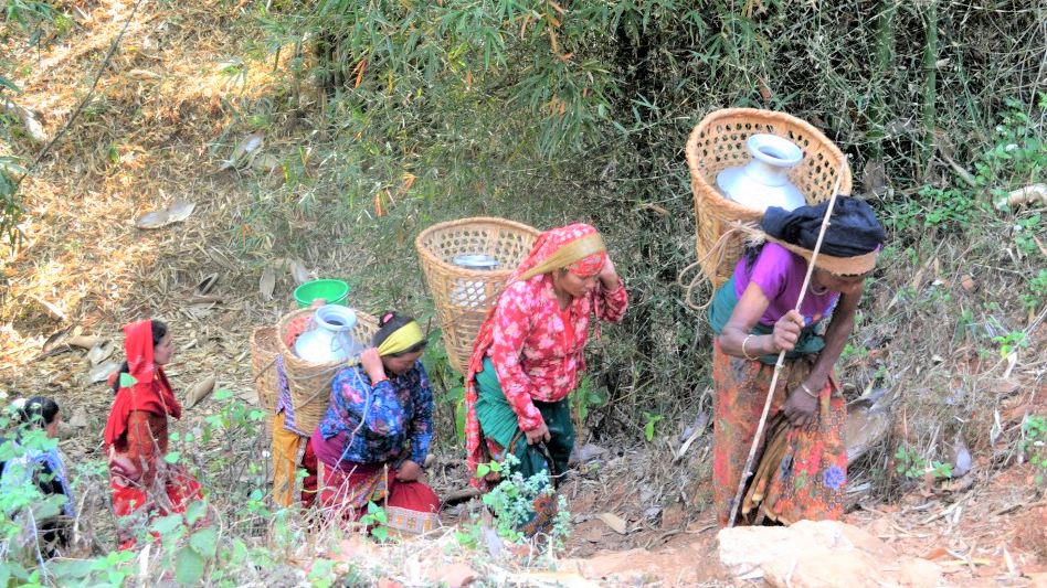 Women and children carry water several times a day.