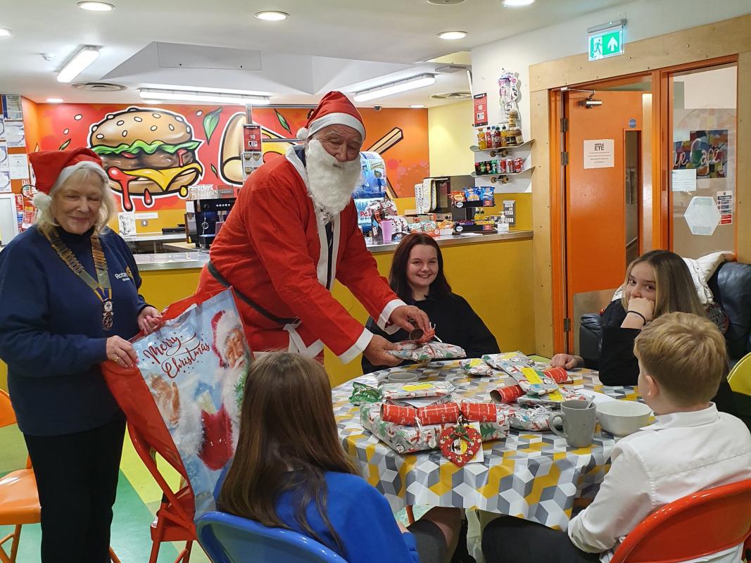 Young Carers at Christmas - Santa bringing the Minehead Young Carers some Christmas Presents