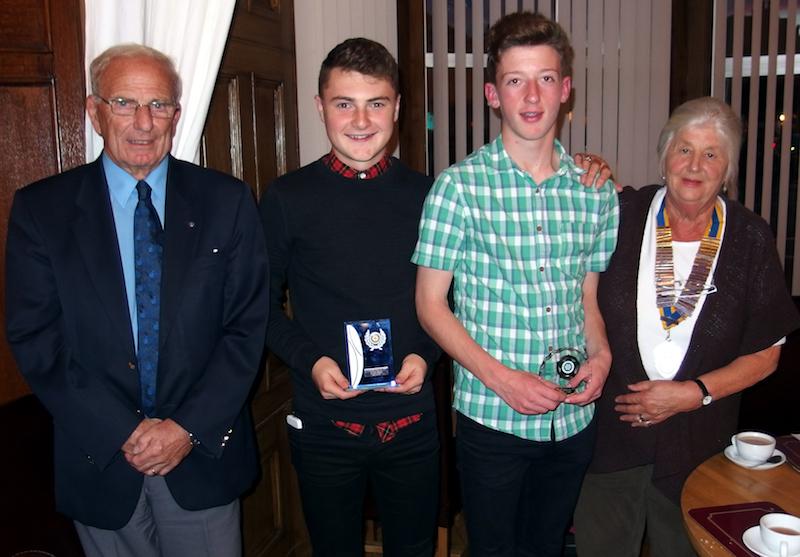 Young Golfer s are presented with their trophies by Dunbar Rotary Club. L to r. Rotarian Rob Renton, Alastair Fell, Jamie Chapman and Club President, Dr. Judy Greenwood